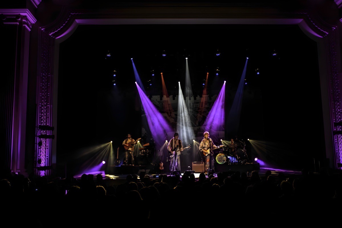 The British Invasion Years on a packed theater stage